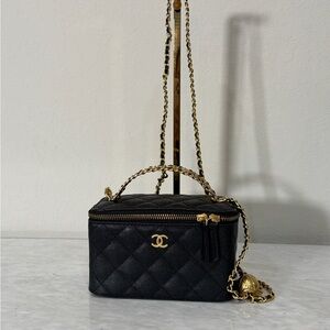 Chanel Black Quilted Mini Bag with Gold Accents